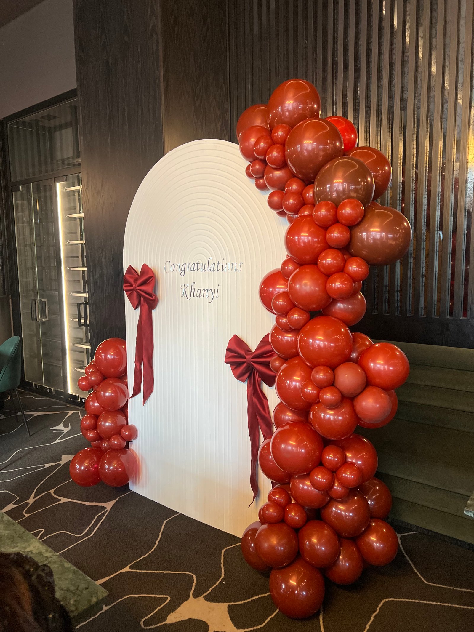 Red and white balloon garland