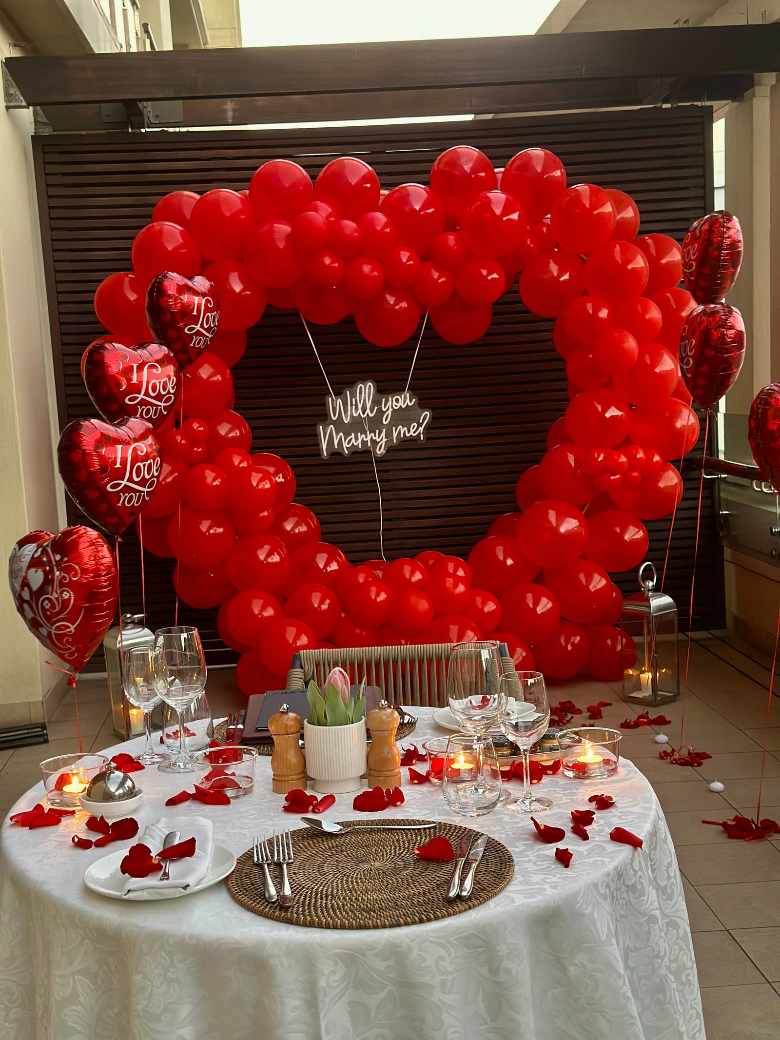 Red balloon heart proposal setup